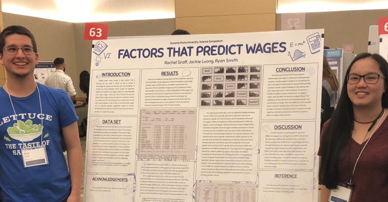 Students presenting their research at a conference