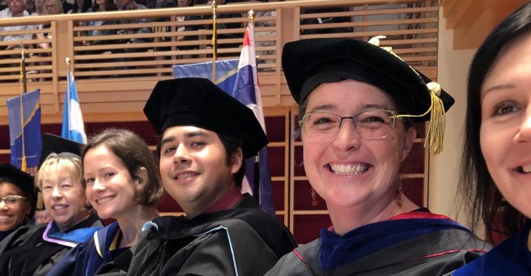 Faculty cheer on graduates at commencement